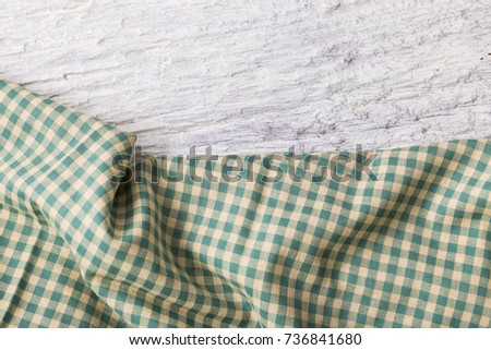 green table cloth on wooden