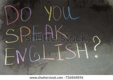 Do you speak English? written on the school board shallow