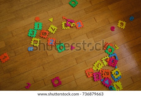 kids playroom with number puzzle, education concept