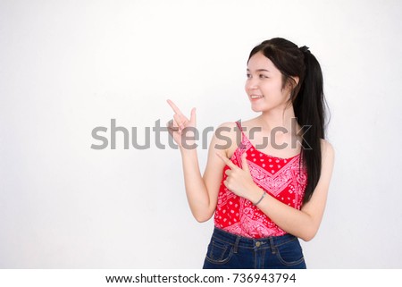 Portrait of thai adult beautiful red shirt pointing