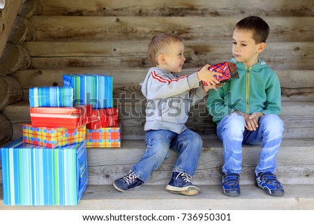children and boxes with gifts. the concept of conjecture. Holiday scene