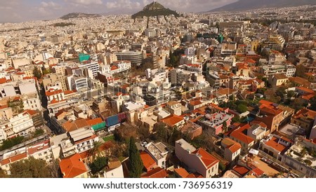 Aerial birds eye view photo taken by drone of iconic Plaka district, Athens historic center, Attica, Greece