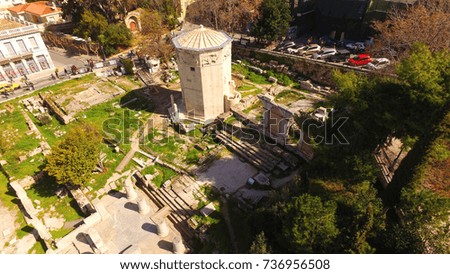 Aerial birds eye view photo taken by drone of iconic Tower of Winds in Roman forum, Plaka district, Athens historic center, Attica, Greece