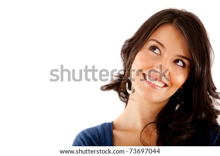 Beautiful thoughtful woman looking up - isolated over white