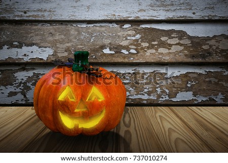 Halloween background. Old wooden with and pumpkin. Halloween design with pumpkins.