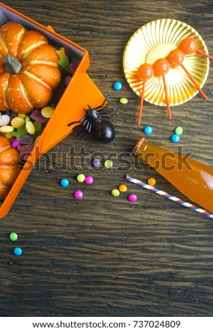 halloween party dessert candy decor top view on wood