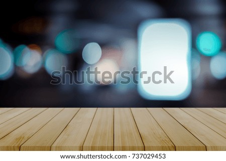 Empty wooden table with blurred city night background,product display montage Concept,Template mock up for display of product.Mock up for display or montage of product,Business presentation