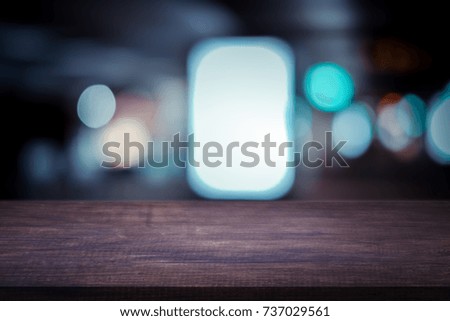 Empty wooden table with blurred city night background,product display montage Concept,Template mock up for display of product.Mock up for display or montage of product,Business presentation