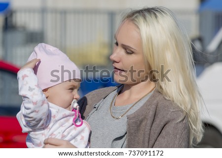 girl with a young child 