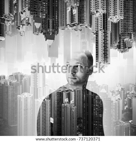 Double exposure concept collage. Young European man over modern cityscape background, black and white photo