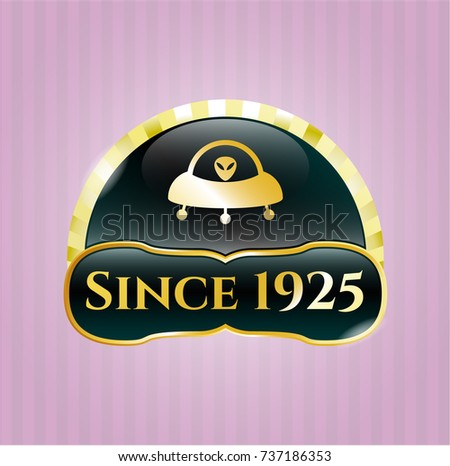  Gold shiny badge with ufo with aline inside icon and Since 1925 text inside