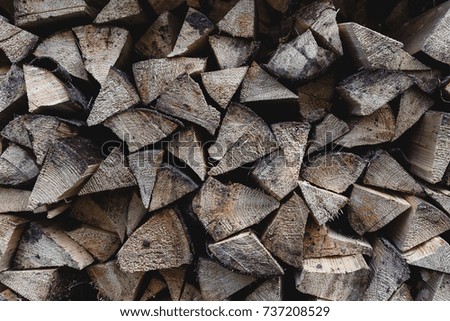 Pile of wood logs. Chopped firewood logs in pile.