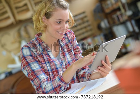 woman retouching sketch on laptop free space