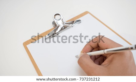 paper board and hand write pen white background
