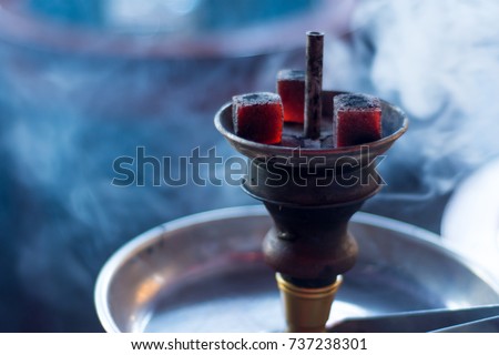 Hookah head with cold blue tone Royalty-Free Stock Photo #737238301