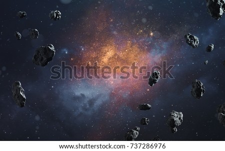 Abstract cosmic background with asteroids and glowing stars. Elements of this image furnished by NASA Royalty-Free Stock Photo #737286976