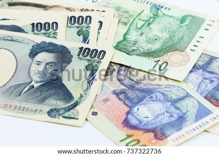 Currency exchange rate of Japan Yen banknote and South Africa Rand banknote for traveller holiday money exchange market