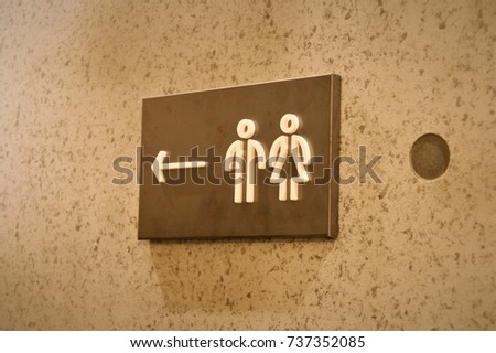 modern public toilet sign 
