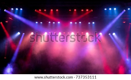 Lighting equipment on an empty stage. Red and blue. Royalty-Free Stock Photo #737353111