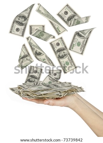 Many dollars falling on womans hand with money