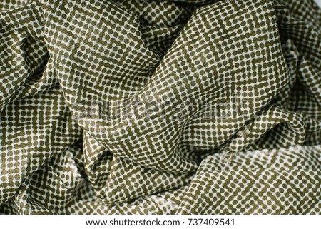 green polka dots fabric texture background