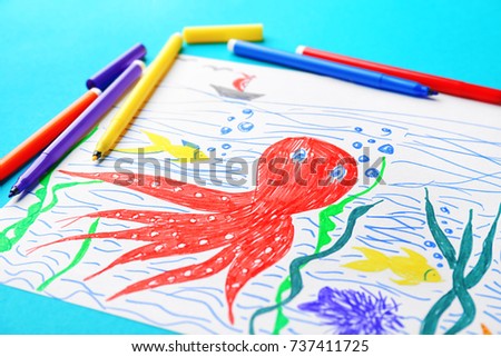 Child's drawing of underwater world on color background, closeup