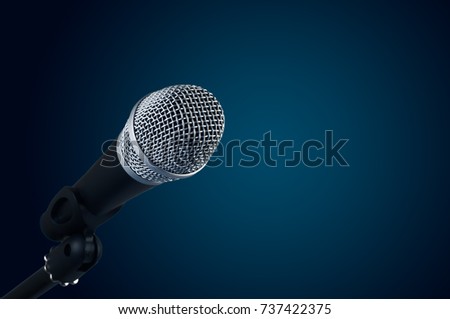 the classic vintage silver microphone on green background.