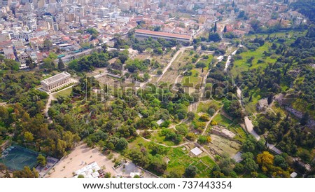 Aerial bird's eye view photo taken by drone of iconic Ancient Agora as seen from Athens Observatory, Athens historic center, Attica, Greece