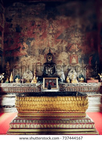 historic Buddha statue  in Wat Thung Si Muang Buddhism temple Ubon Ratchathani, Thailand