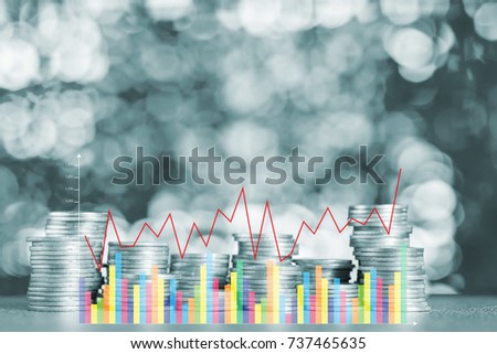 Double exposure of stacks of coins on the table with financial graph chart, finance banking and business concept.