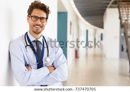 Portrait of young male doctor with stethoscope, close up Royalty-Free Stock Photo #737470705