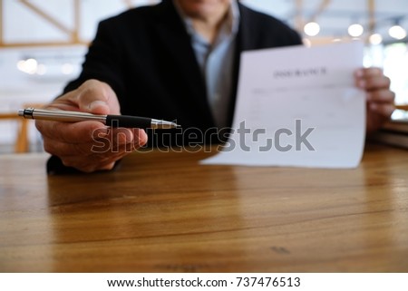 Business man signing contract making a deal with real estate agent Concept for consultant and home insurance concept
