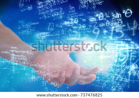 Hand of man pretending to hold an invisible object against digitally generated image of polynomial equations with solution