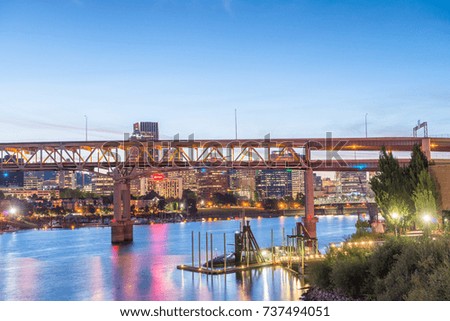 Beautiful night view of Downtown Portand and Willamette River reflections.