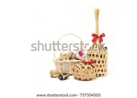 Thai traditional dessert in wicker bamboo basket On white background.