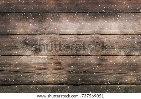 Snowy brown wooden background. Banner with copy space
