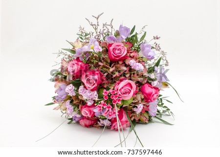 Wedding bouquet made of pink roses isolated on a white background