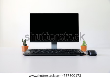 blank screen Computer, Desktop PC. for business on work table front view Royalty-Free Stock Photo #737600173