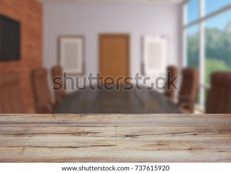 The wooden table. Blurred interior. Office