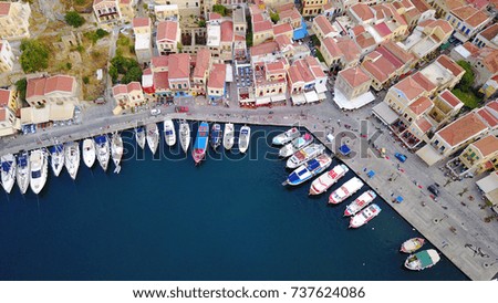 Aerial birds eye view photo taken by drone of Yalos, iconic port of Symi island at sunset
, Dodecanese, Greece