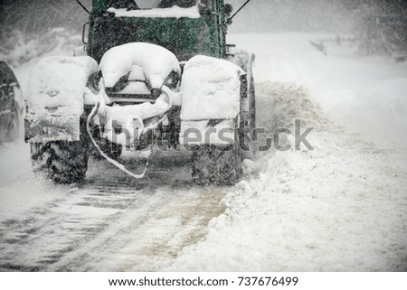 snow removal equipment on the road