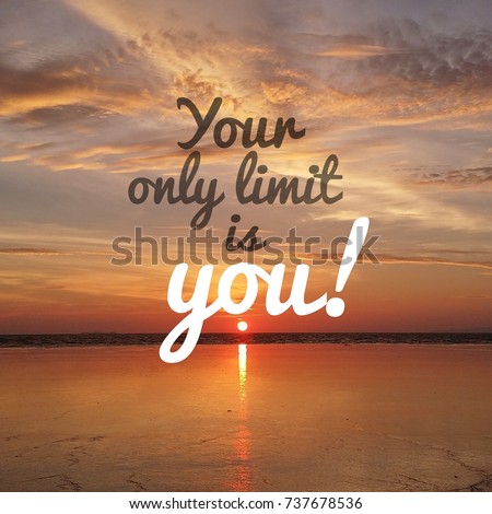 Inspirational motivation quote YOUR ONLY LIMIT IS YOU on nature sunset background.