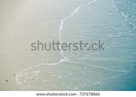 Soft wave of blue ocean on sandy beach,Background,landscape,water  blue sea.