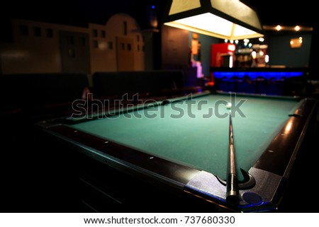 Billiard table with cue 