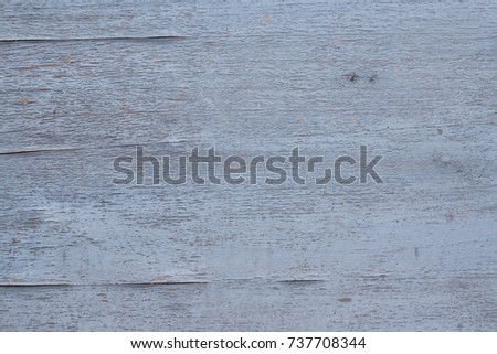 Wooden background in delicate shades of pastel blue and gray. Shabby chic texture.