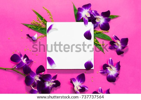 The white paper is adorned with violet orchids and has a pink background making it even more attractive.