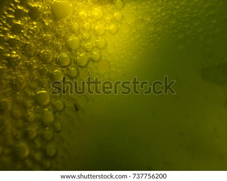 Bubbles, Watercolor paint dissolves in water, backlighting from different directions, large magnification, bokeh, Colored abstractions