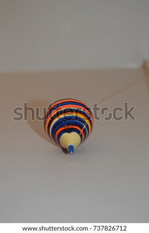 studio photography of a top game vintage wooden white background colorful object 