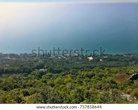 Wonderful view of Trieste 's landscape in Italy where the sea meets the mountains in a unique way. Royalty-Free Stock Photo #737858644