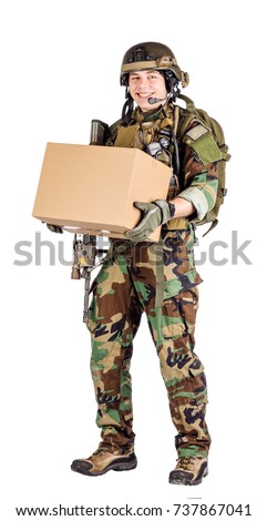 Soldier Holding Shipping Box.